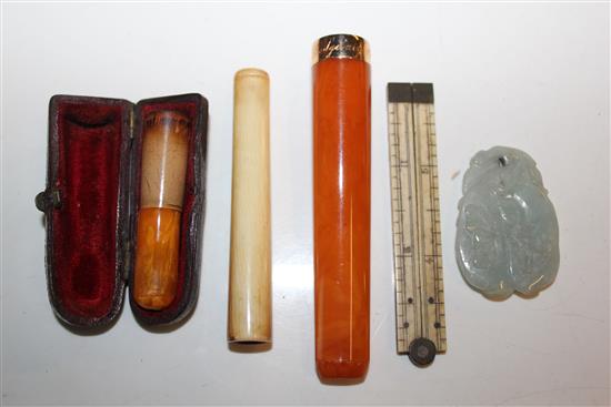 2 x amber cig holders and 3 other items